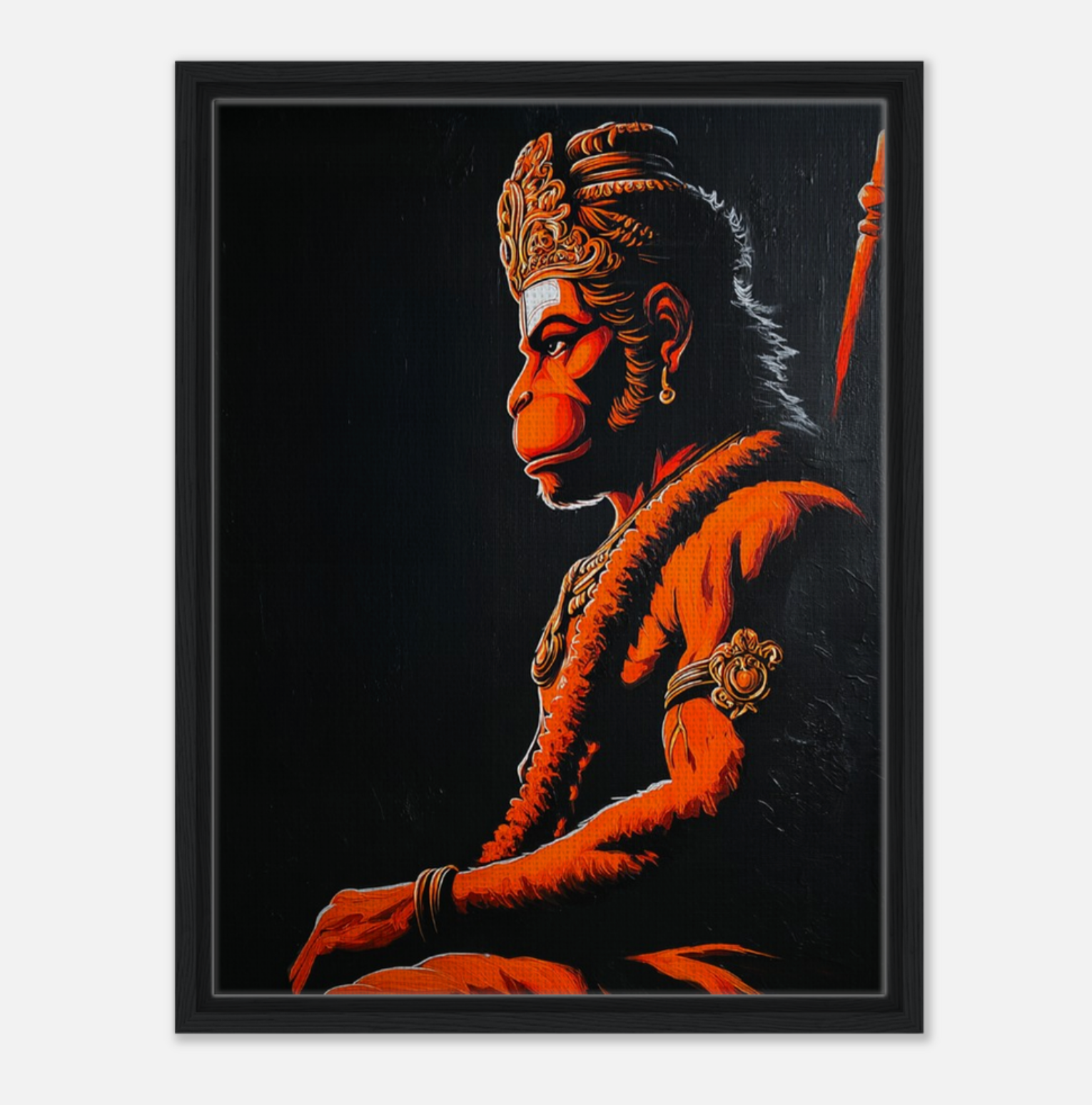 Framed artwork of Hanuman ji with orange and black colors on a dark background.