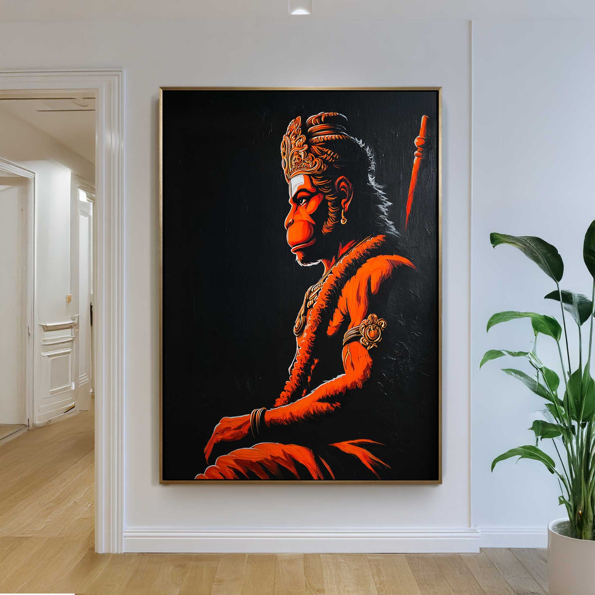 Framed artwork of Hanuman ji Hindu Spiritual art on a wall in a home setting with a plant.